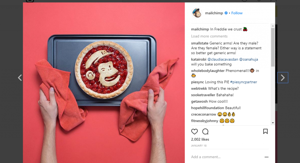 Monkey on pie, red background.