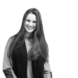 Woman, Kristina Centnere, CEO of Social Cow.