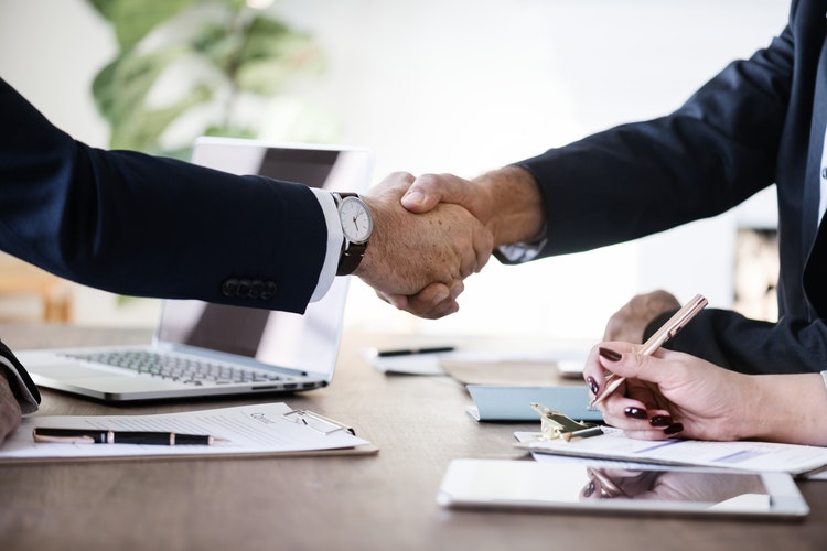 Business handshake, good customer service.