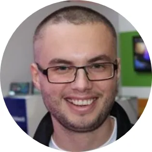 Man smiling, customer retention focus.