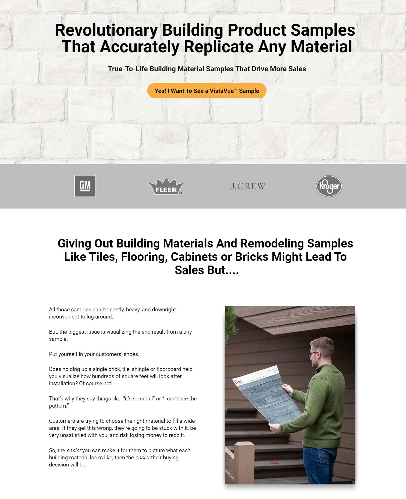 Man holds building material sample.