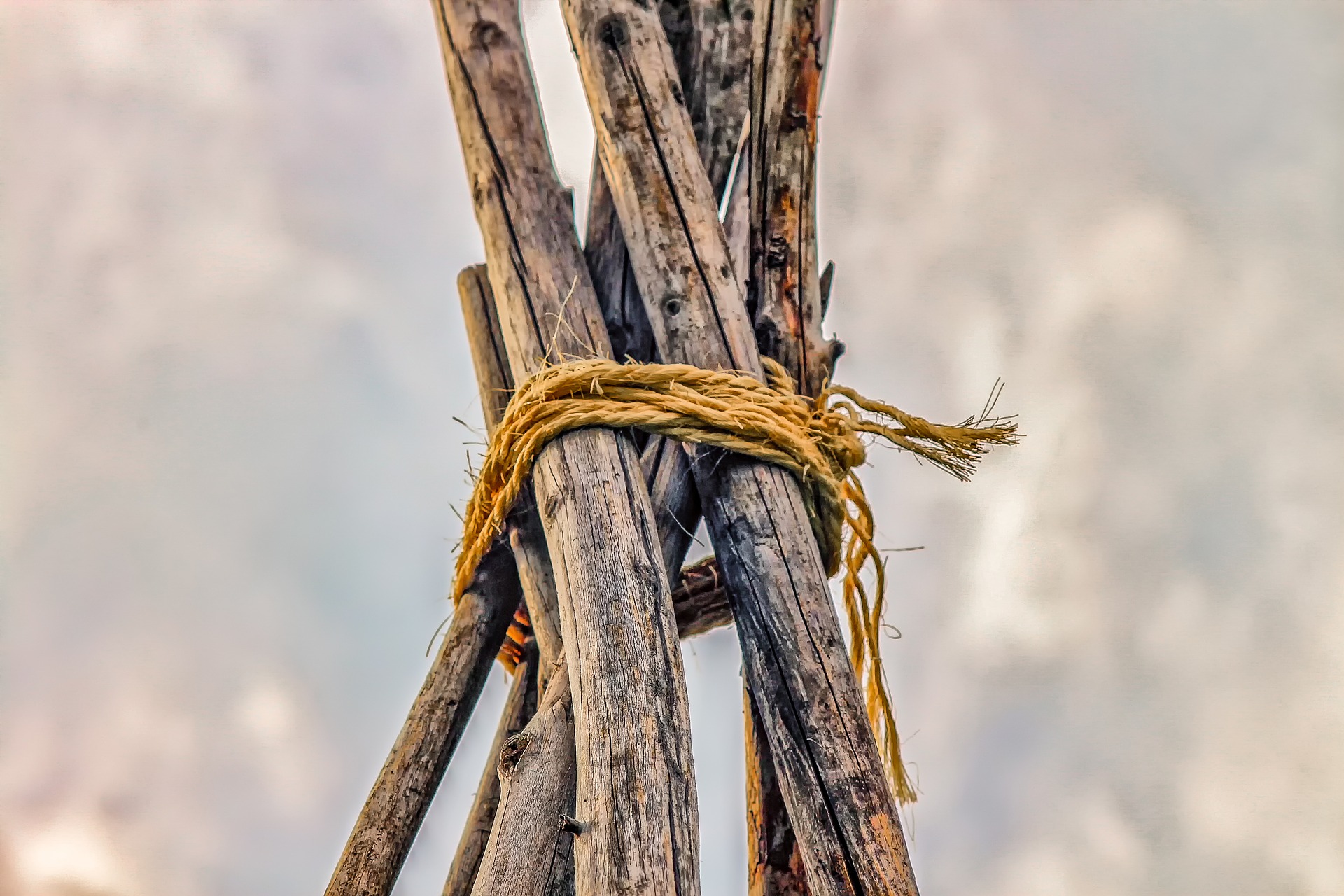 Wooden poles tied with rope.