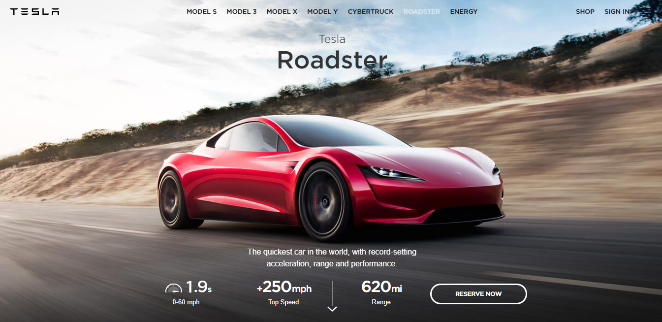 Red Tesla Roadster sports car.