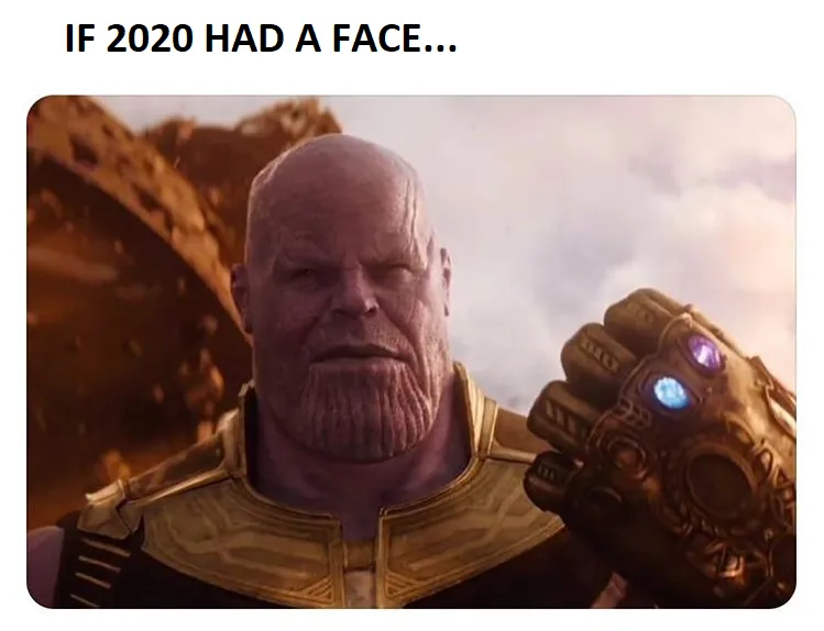 Thanos as 2020, distracted by social media.