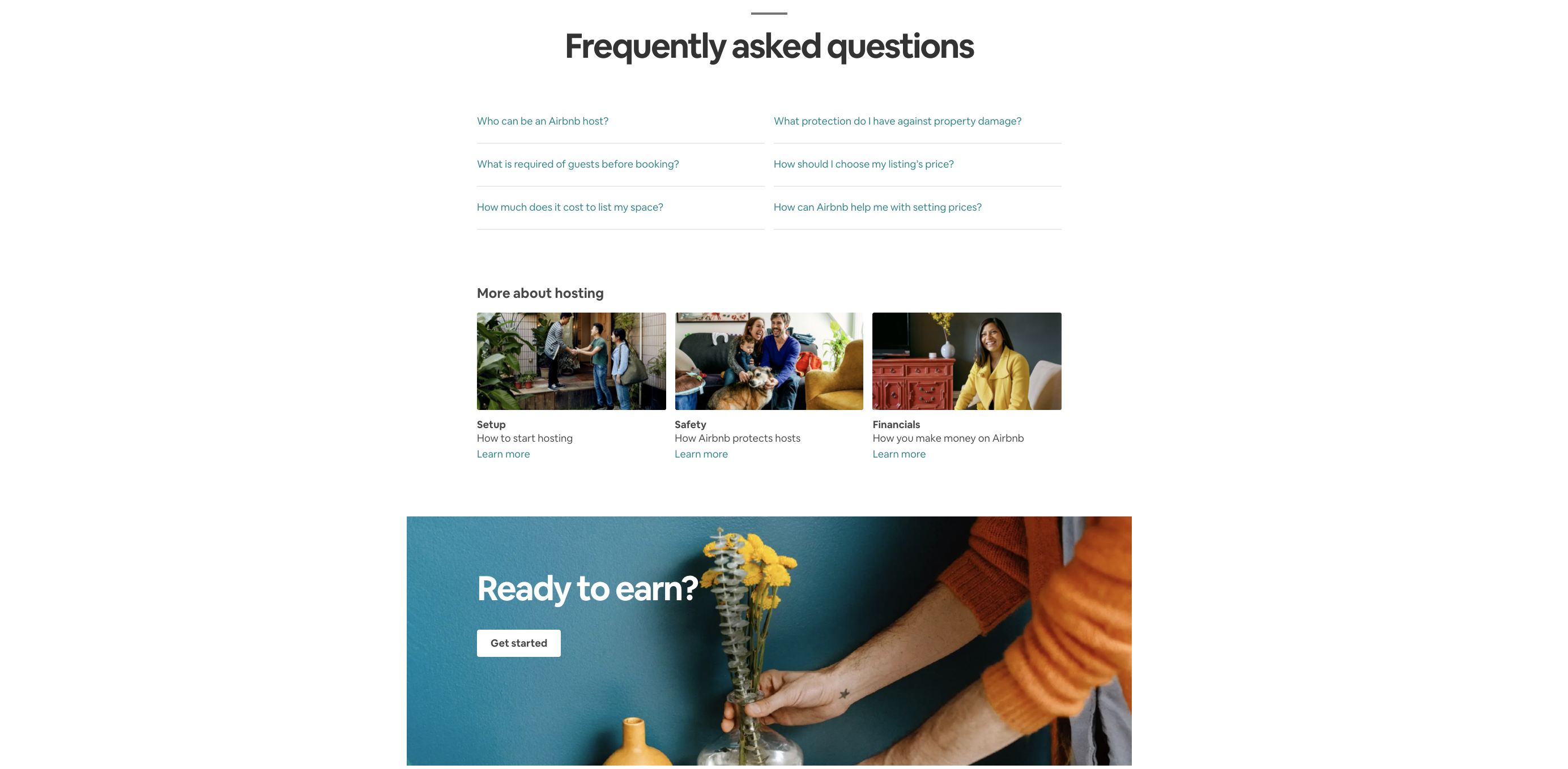 Person arranging flowers in kitchen.