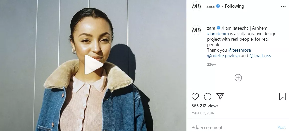 Woman wearing Zara denim jacket.