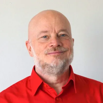 Man in red shirt, expert content creator.