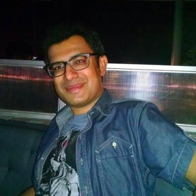 Man in glasses, software founder.