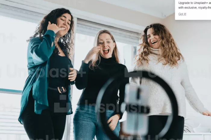 Women recording short video.