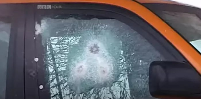 Bullet-resistant car window.