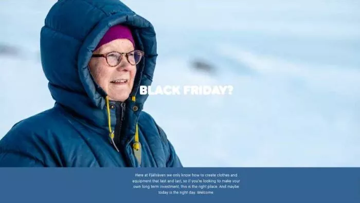 Person in winter coat, Black Friday sale.