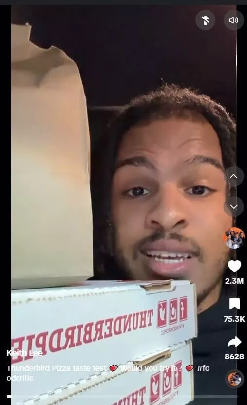 Man reviewing Thunderbird Pizza.